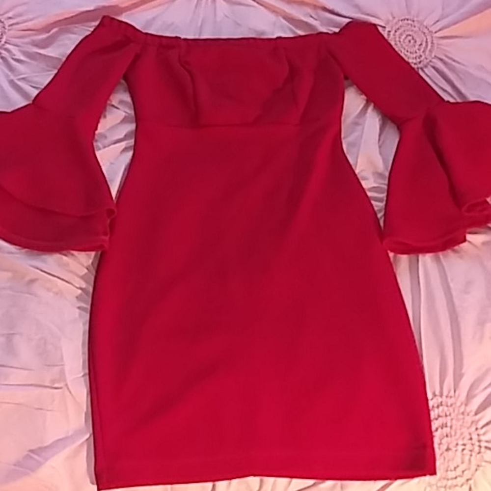 A red off shoulder dress